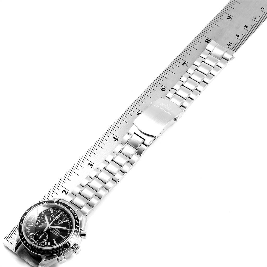 The image shows an Omega Speedmaster 3220.50.00 Men
s Stainless Steel Black Dial 3220.50.00 Men
s Stainless Steel Black Dial watch from a top-down angle, displaying the face, bezel, and metal bracelet with a close scale.