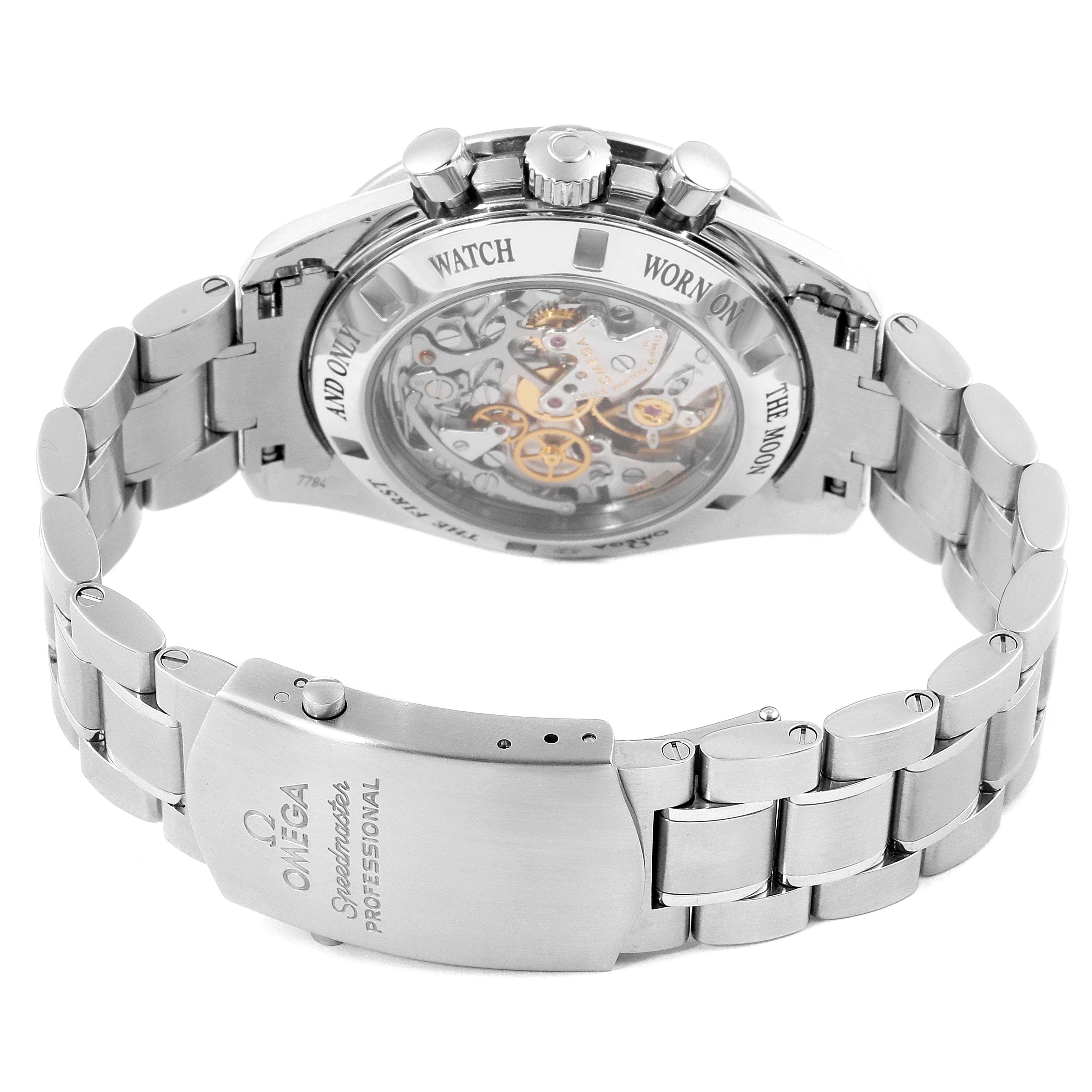 The image shows the back and clasp of an Omega Speedmaster 311.30.42.30.01.006 Men
s Stainless Steel Black Dial 311.30.42.30.01.006 Men
s Stainless Steel Black Dial watch, highlighting its internal mechanics and metal bracelet.