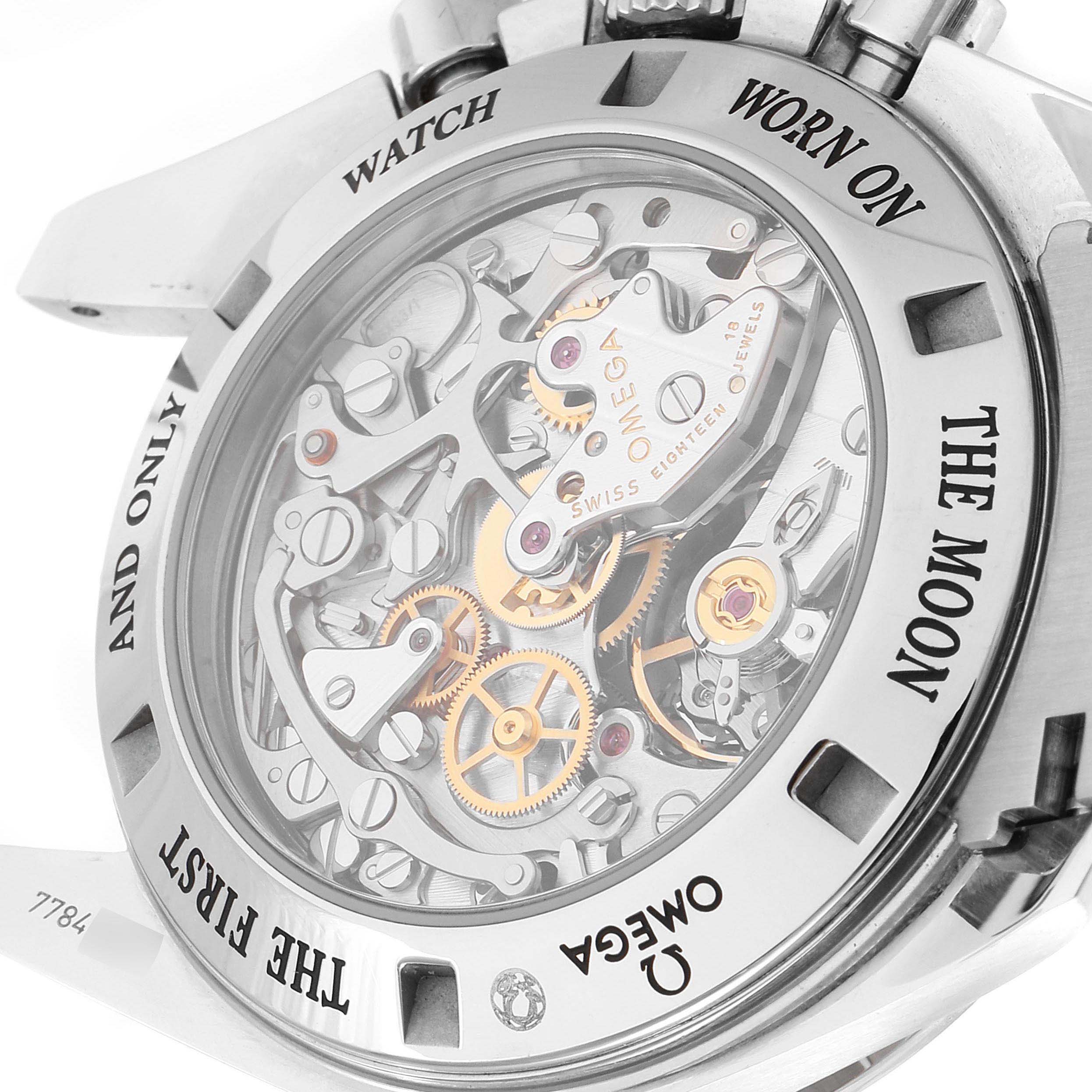 The image shows the case back of the Omega Speedmaster 311.30.42.30.01.006 Men
s Stainless Steel Black Dial 311.30.42.30.01.006 Men
s Stainless Steel Black Dial, highlighting its intricate movement and engraving.