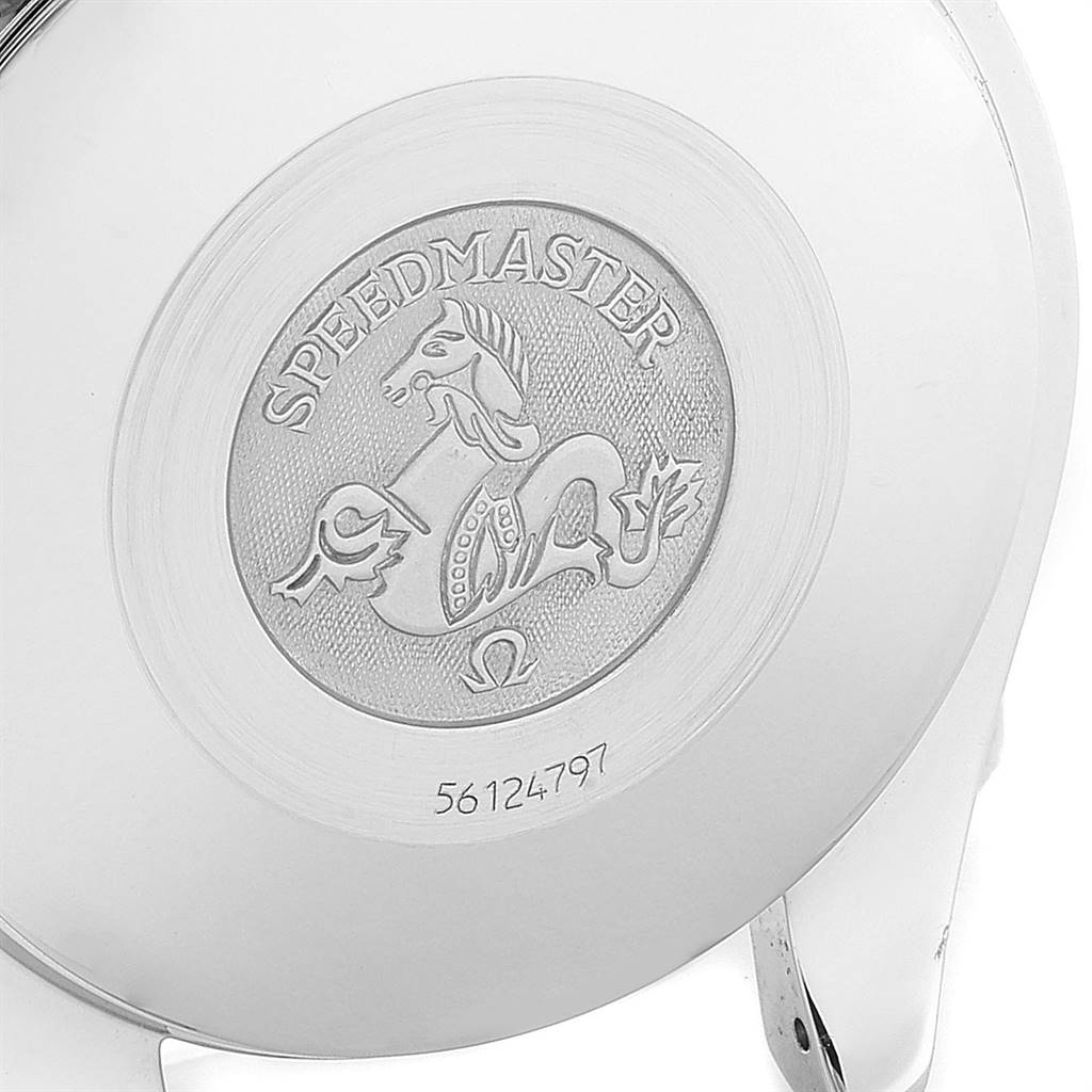 The image shows the back case of an Omega Speedmaster 3511.80.00 Men
s Stainless Steel Blue Dial 3511.80.00 Men
s Stainless Steel Blue Dial watch, highlighting the engraved logo and serial number.