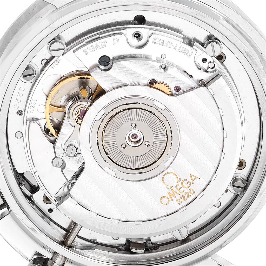 The image shows the intricate inner workings of an Omega Speedmaster 3510.50.00 Men
s Stainless Steel Black Dial 3510.50.00 Men
s Stainless Steel Black Dial watch, focusing on its movement mechanism.