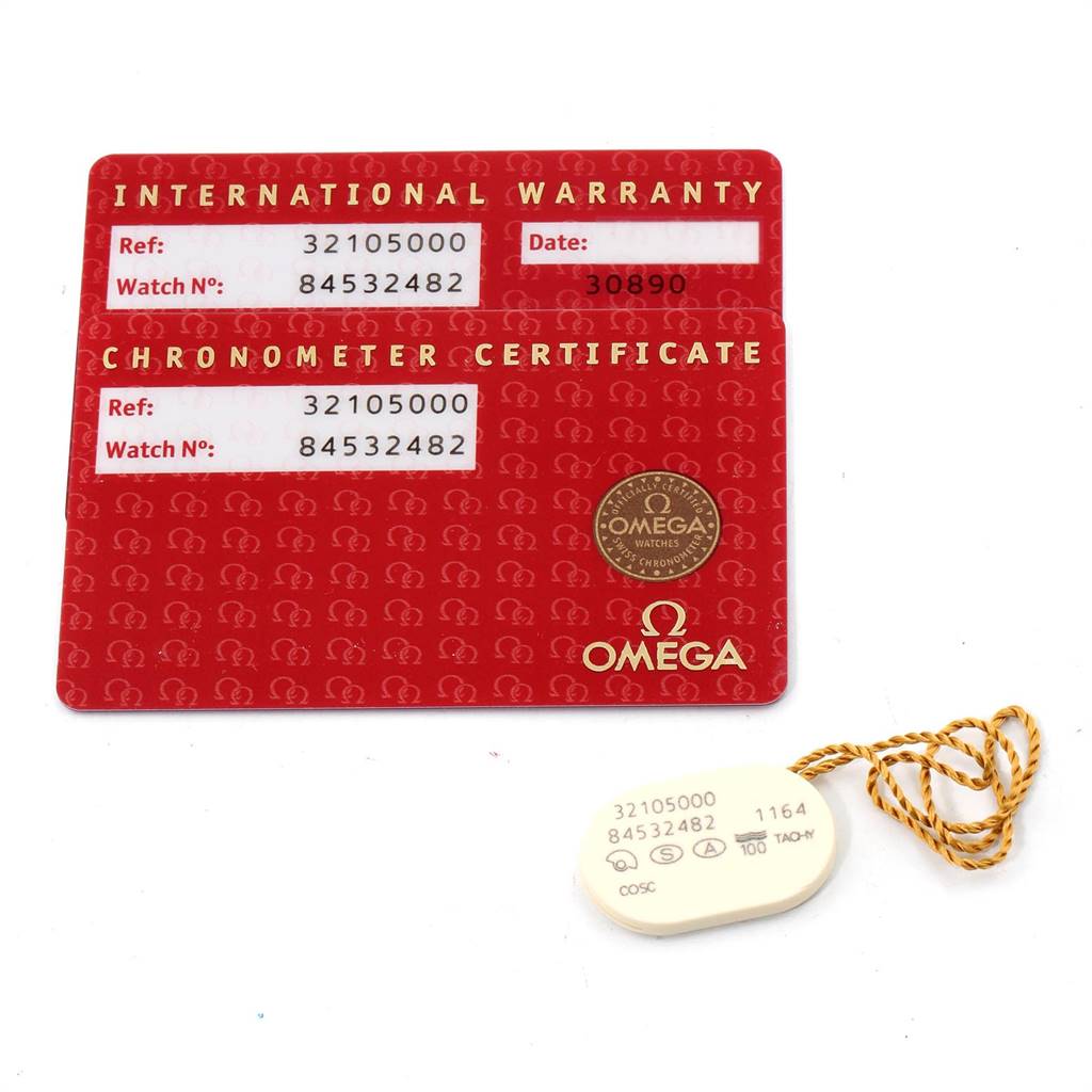 The image shows the International Warranty and Chronometer Certificate cards, and a tag for the Omega Speedmaster 3210.50.00 Men
s Stainless Steel Black Dial 3210.50.00 Men
s Stainless Steel Black Dial.