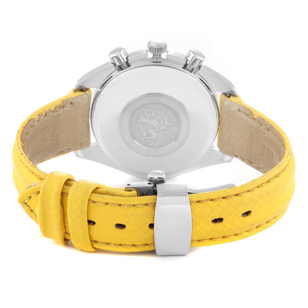 The image shows the rear view of an Omega Speedmaster 3511.12.00 Men's Stainless Steel Yellow Dial 3511.12.00 Men's Stainless Steel Yellow Dial watch, highlighting the case back and yellow leather strap.