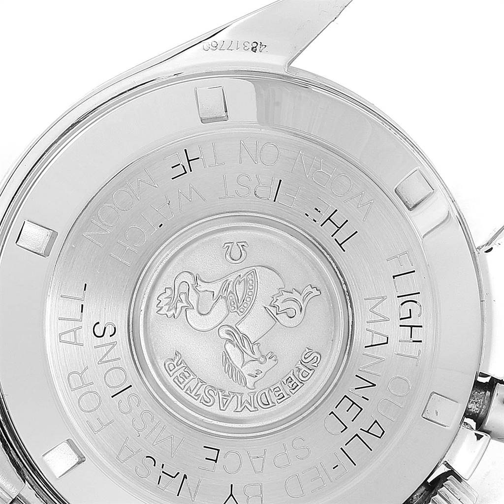 The image shows the back case of the Omega Speedmaster Men's Stainless Steel Black Dial Men's Stainless Steel Black Dial watch, featuring engraved text and a centered emblem.