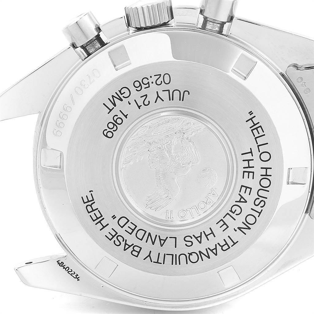 The image shows the back case of an Omega Speedmaster 3560.50.00 Men
s Stainless Steel Black Dial 3560.50.00 Men
s Stainless Steel Black Dial watch with engraved text and an illustration.