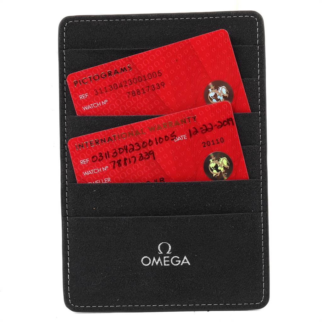The image shows the warranty and pictogram cards for an Omega Speedmaster 311.30.42.30.01.005 Men
s Stainless Steel Black Dial 311.30.42.30.01.005 Men
s Stainless Steel Black Dial watch inside a black Omega cardholder.