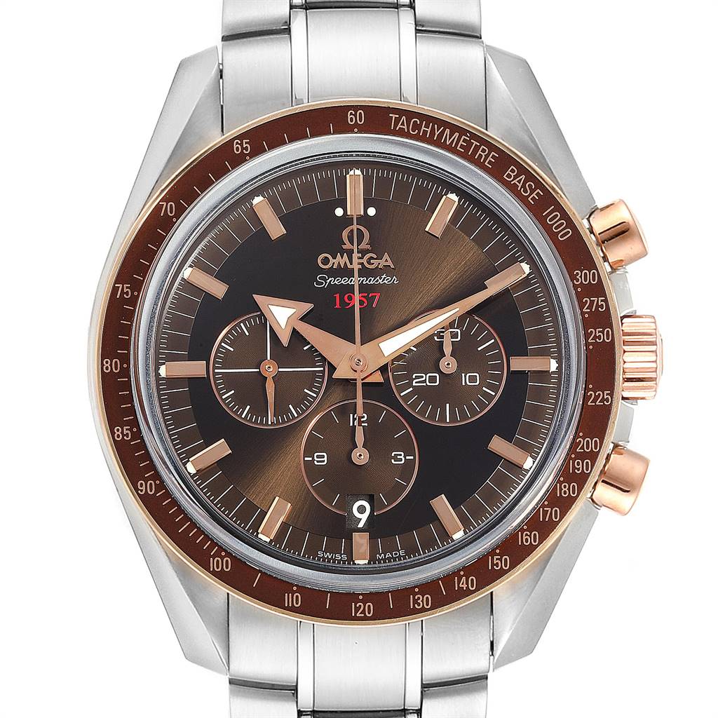 The Omega Speedmaster 321.90.42.50.13.002 Men's Steel and Gold (two tone) Brown Dial 321.90.42.50.13.002 Men's Steel and Gold (two tone) Brown Dial watch is shown from a front angle, highlighting the dial, bezel, and part of the bracelet.