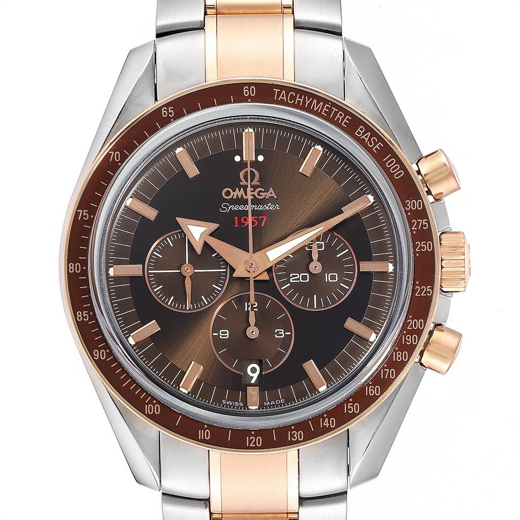 The image shows a close-up, front view of the Omega Speedmaster 321.90.42.50.13.001 Men's Steel and Gold (two tone) Brown Dial 321.90.42.50.13.001 Men's Steel and Gold (two tone) Brown Dial watch, highlighting the dial, hands, subdials, and tachymeter bezel.