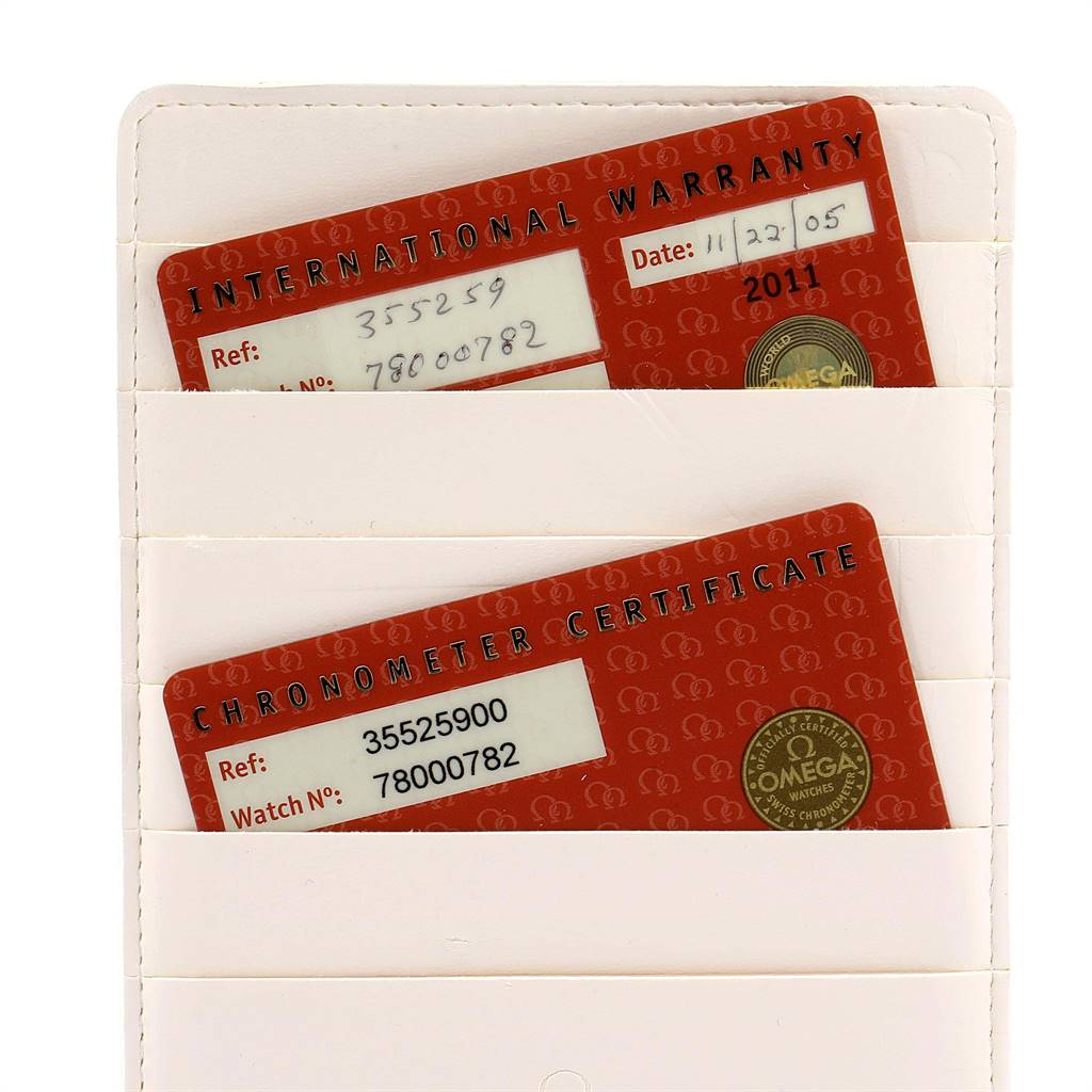 The image shows an International Warranty card and Chronometer Certificate card for an Omega Speedmaster 3552.59.00 Men
s Stainless Steel Black Dial 3552.59.00 Men
s Stainless Steel Black Dial watch.