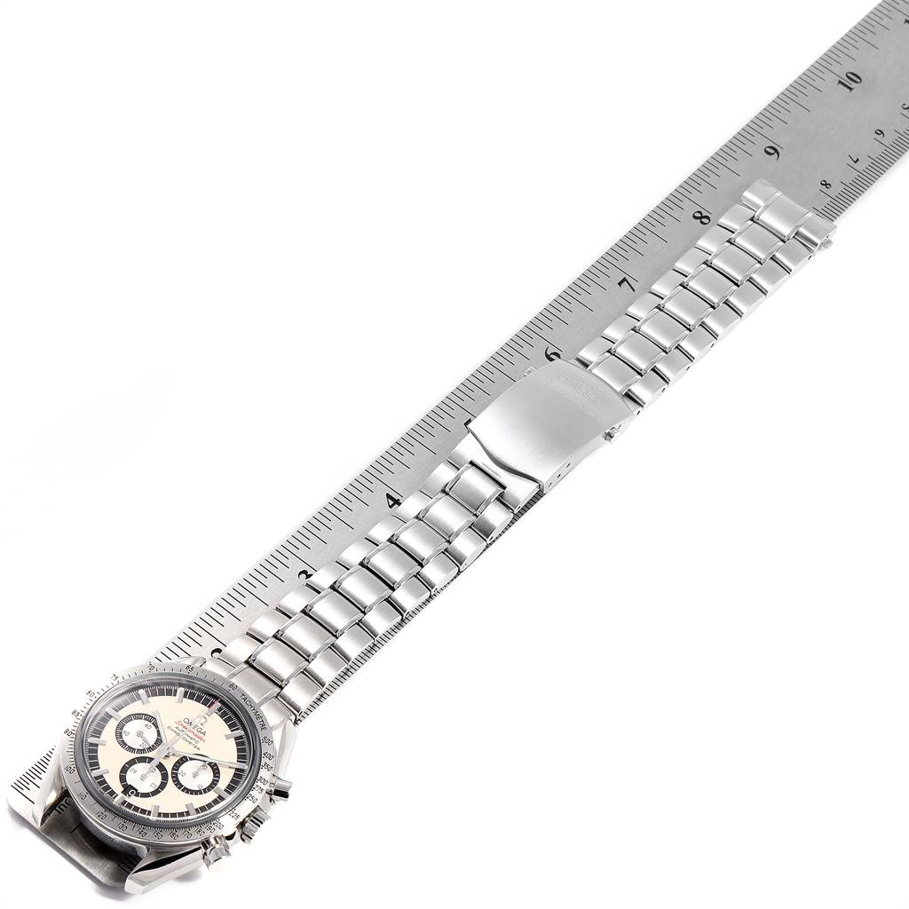 This image shows an Omega Speedmaster 3506.31.00 Men's Stainless Steel Silver Dial 3506.31.00 Men's Stainless Steel Silver Dial watch laid flat on a ruler, displaying its face and metal bracelet.