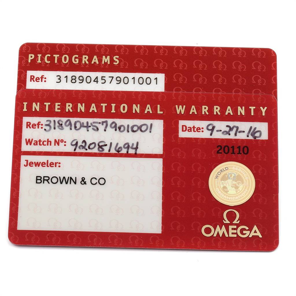 This image shows warranty and pictogram cards for an Omega Speedmaster 318.90.45.79.01.001 Men's Titanium Black Dial 318.90.45.79.01.001 Men's Titanium Black Dial watch, including reference numbers and the jeweler's information.