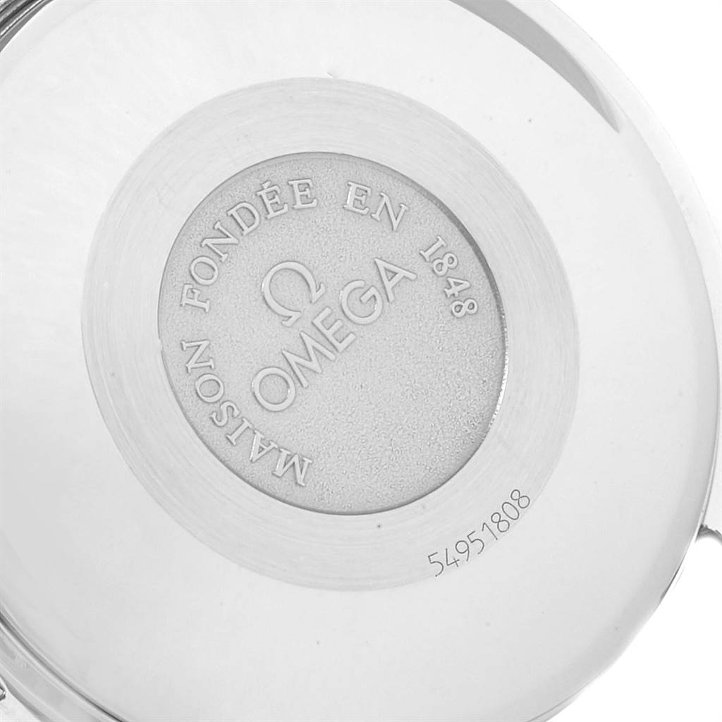 The image shows the case back with the engraving of an Omega Speedmaster 3523.30.00 Men
s Stainless Steel Silver Dial 3523.30.00 Men
s Stainless Steel Silver Dial watch at a close-up angle.