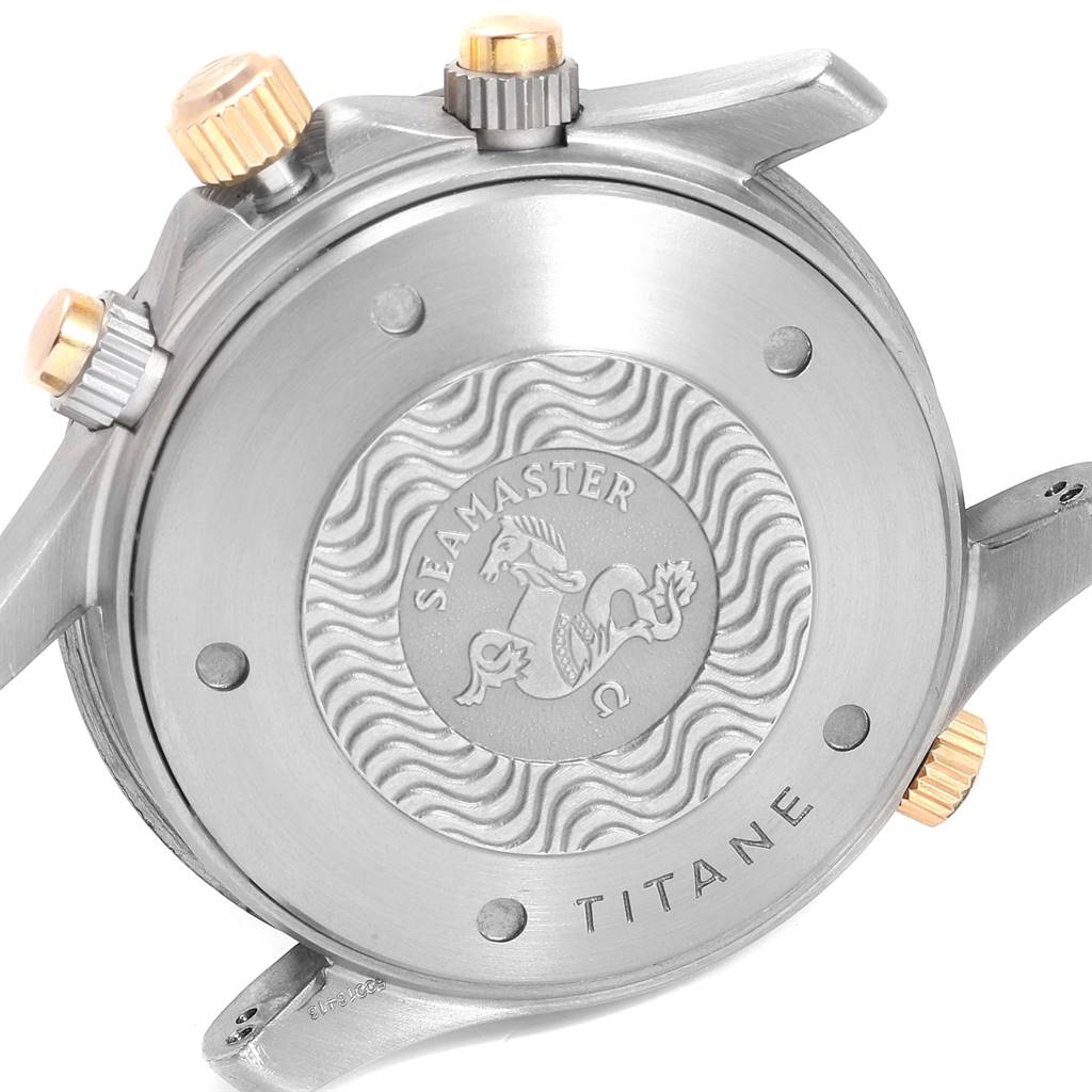 This image shows the back case and crown of an Omega Seamaster watch, labeled "Titane."