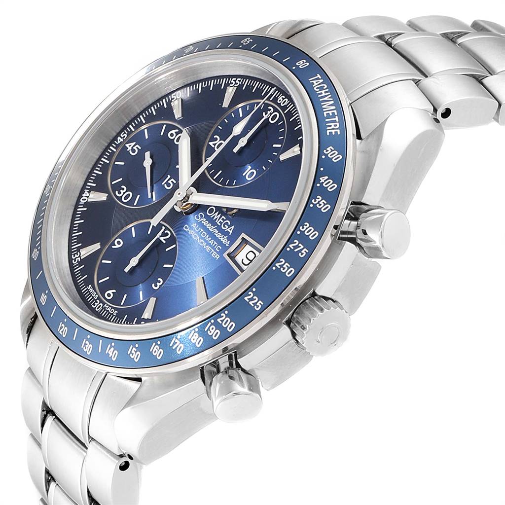 The image shows a side angle of an Omega Speedmaster 3212.80.00 Men
s Stainless Steel Blue Dial 3212.80.00 Men
s Stainless Steel Blue Dial watch, highlighting its blue dial, chronograph subdials, pushers, and bracelet.