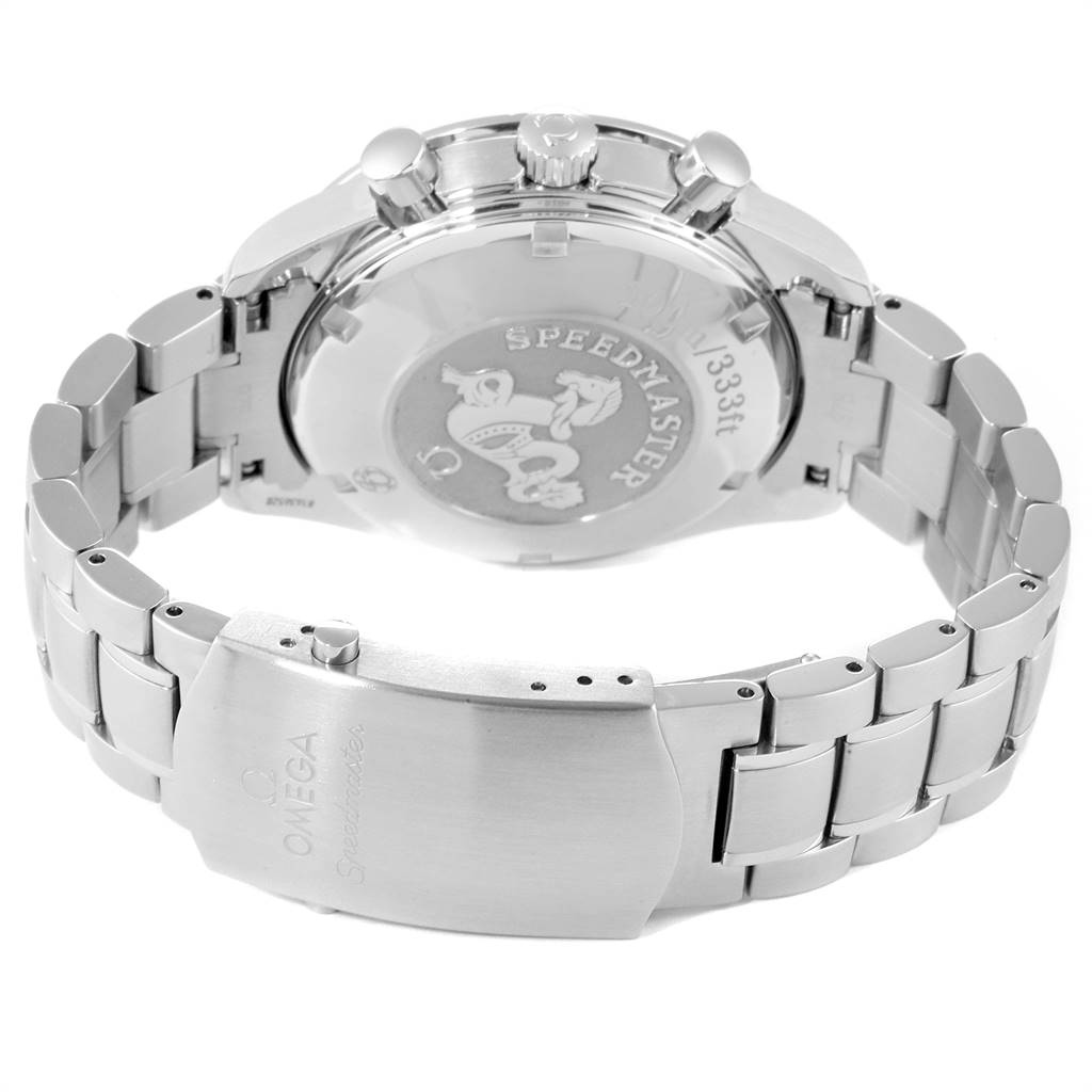 The image shows the back and clasp of an Omega Speedmaster 3212.80.00 Men
s Stainless Steel Blue Dial 3212.80.00 Men
s Stainless Steel Blue Dial watch, highlighting the stainless steel bracelet and engraved case back.