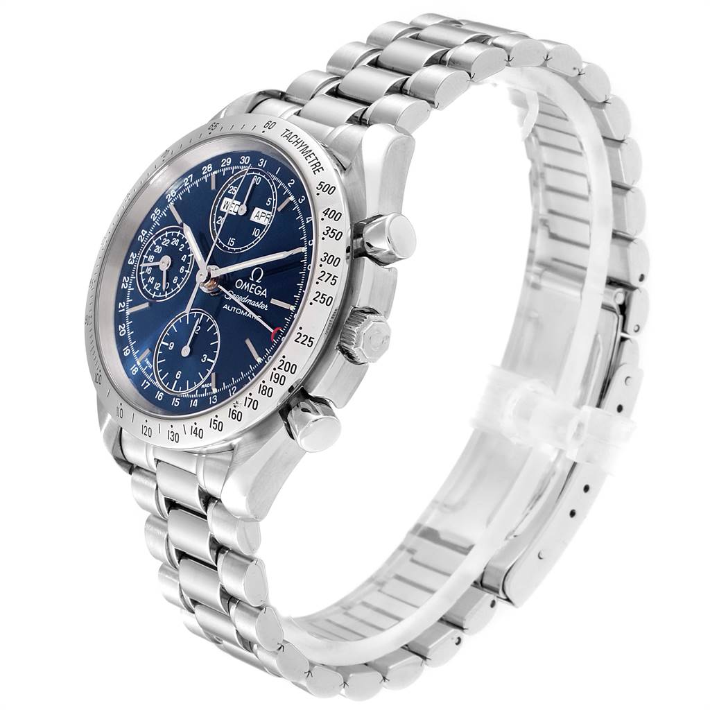 The image shows an angled side view of an Omega Speedmaster 3521.80.00 Men
s Stainless Steel Blue Dial 3521.80.00 Men
s Stainless Steel Blue Dial watch, highlighting its blue dial, tachymeter bezel, and stainless steel bracelet.