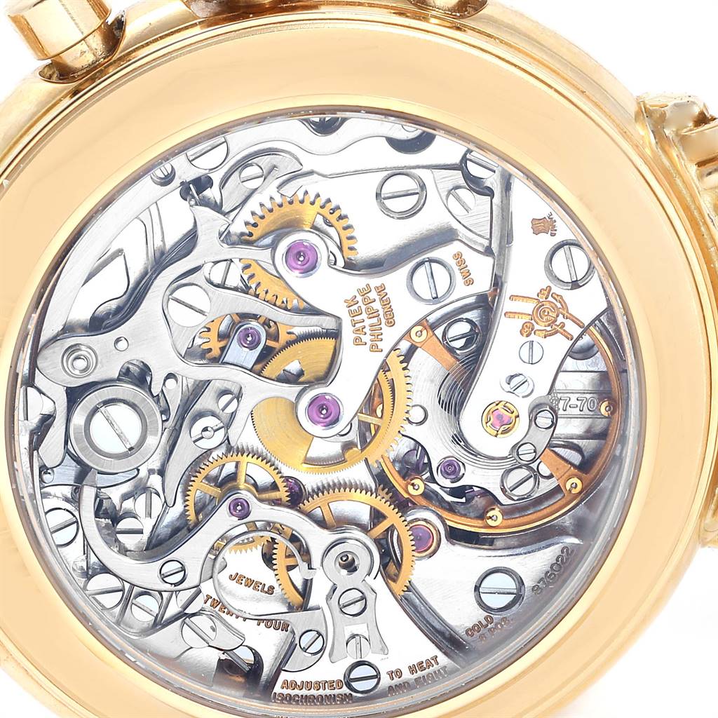 The image shows the underside view of the Patek Philippe 3970 Men's Yellow Gold Silver Dial 3970 Men's Yellow Gold Silver Dial Perpetual Calendar Chronograph Yellow Gold Mens Watch 3970 model, revealing its intricate internal mechanism.