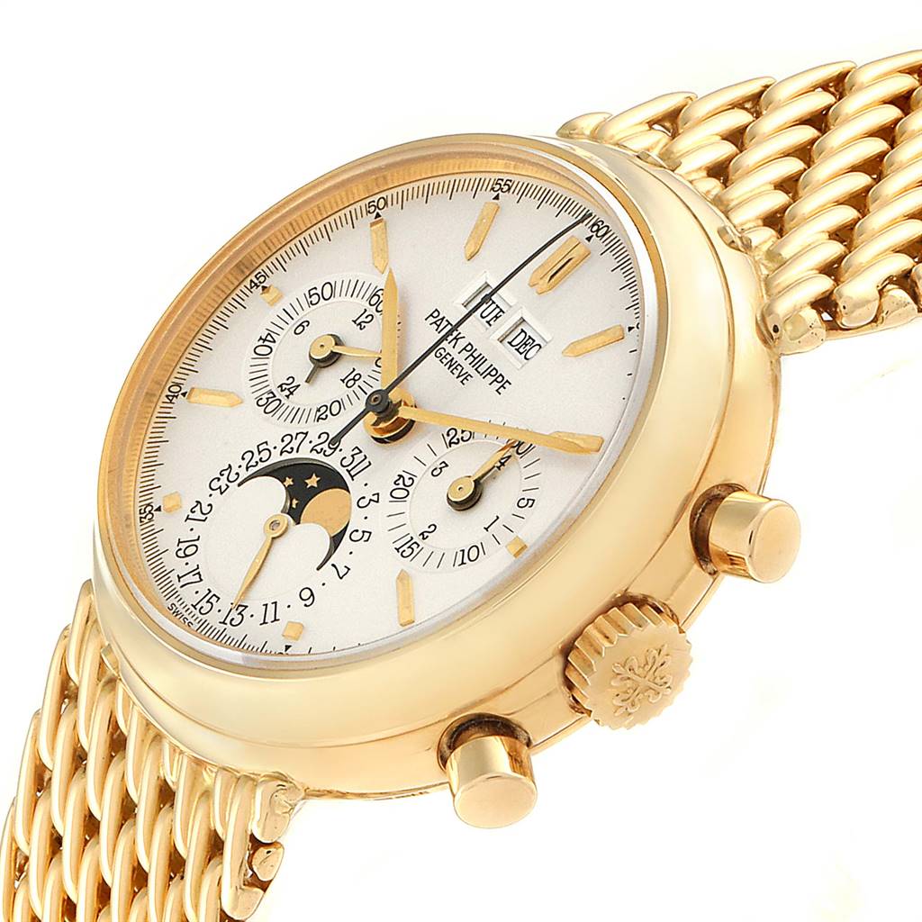 The image shows a close-up, angled view of the face and side buttons of the Patek Philippe 3970 Men's Yellow Gold Silver Dial 3970 Men's Yellow Gold Silver Dial Perpetual Calendar Chronograph Yellow Gold Mens Watch 3970.