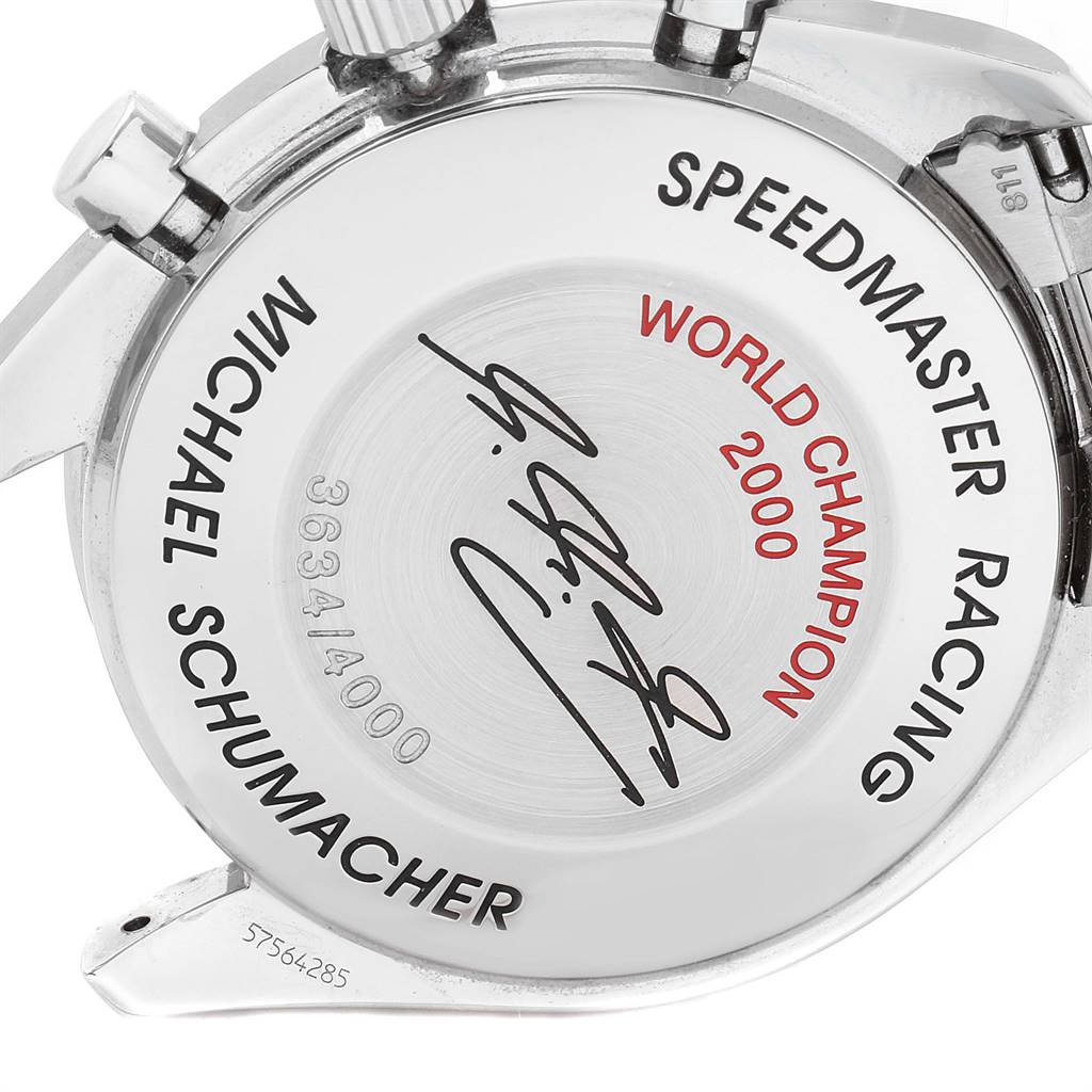 The image shows the back casing of an Omega Speedmaster 3517.30.00 Men's Stainless Steel Silver Dial 3517.30.00 Men's Stainless Steel Silver Dial Racing watch, featuring inscriptions and engravings.