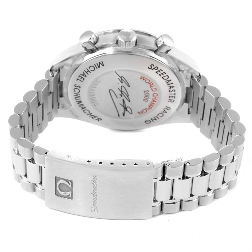 The image shows the back and clasp of an Omega Speedmaster 3517.30.00 Men's Stainless Steel Silver Dial 3517.30.00 Men's Stainless Steel Silver Dial watch, focusing on the engraved case back and metal bracelet.