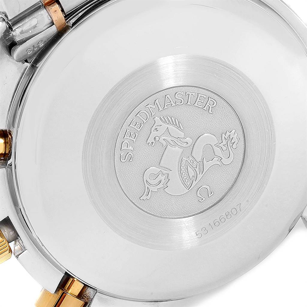 This image shows the back case of an Omega Speedmaster 3716.50.00 Men
s Steel and Gold (two tone) Black Dial 3716.50.00 Men
s Steel and Gold (two tone) Black Dial watch, featuring the engraved emblem and logo.