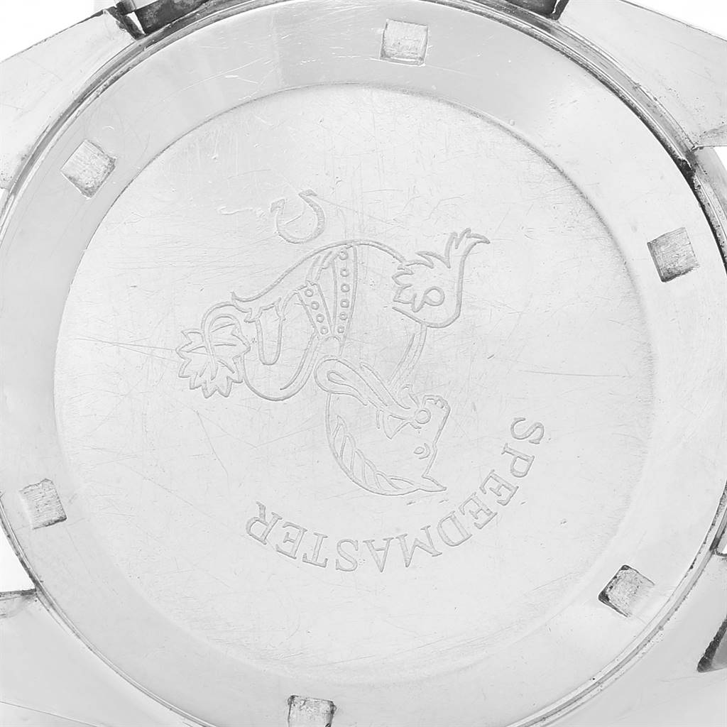 The image shows the case back of an Omega Speedmaster 145.012 Men's Stainless Steel Black Dial 145.012 Men's Stainless Steel Black Dial watch, displaying its engraved logo and markings.