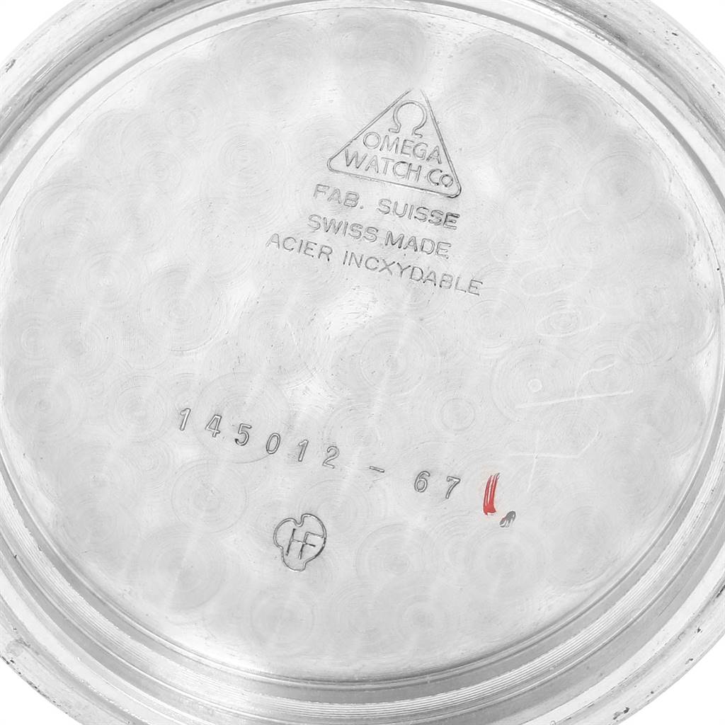 This image shows the inside case back of an Omega Speedmaster 145.012 Men's Stainless Steel Black Dial 145.012 Men's Stainless Steel Black Dial watch, featuring model details and manufacturing information.