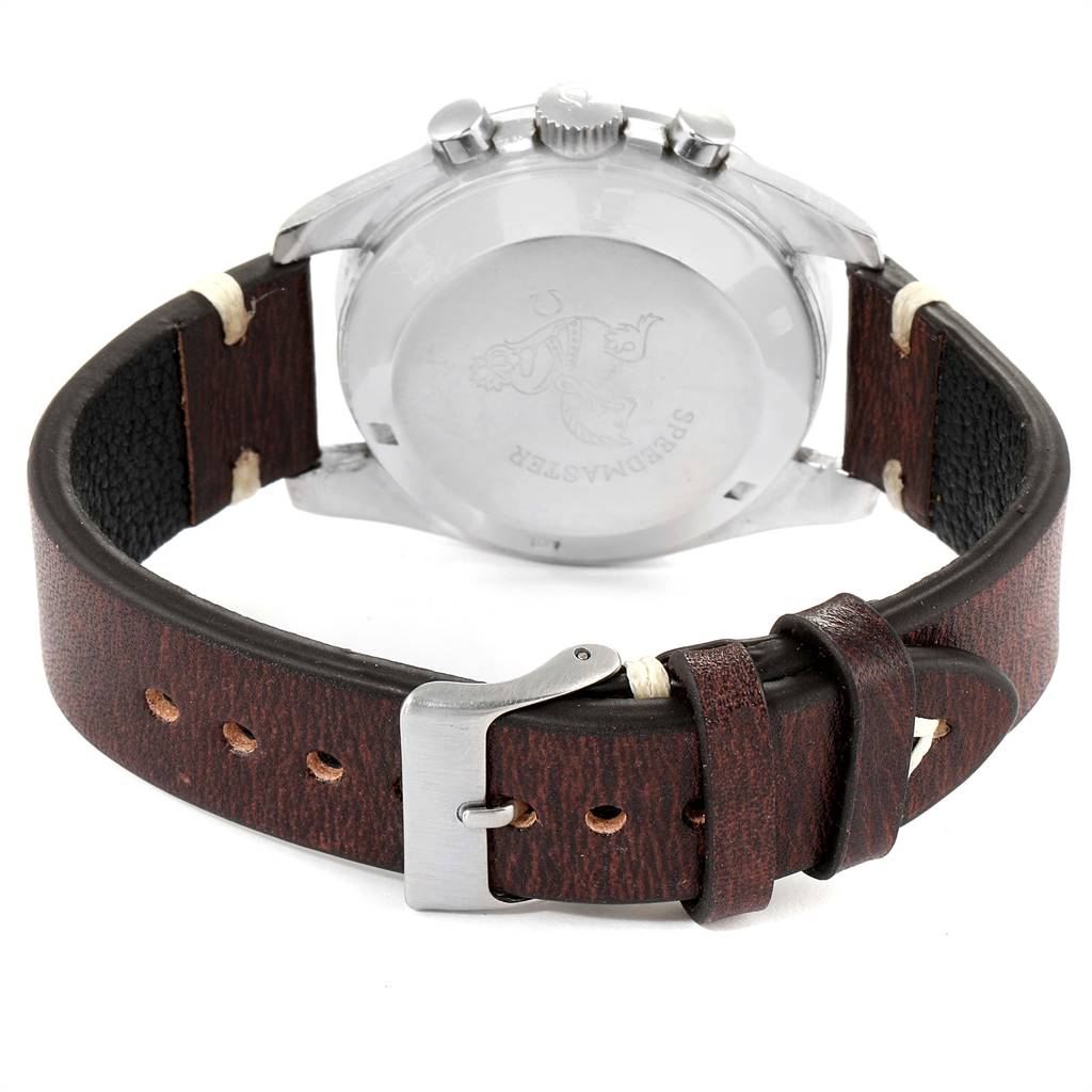 The image shows the back view of an Omega Speedmaster 145.012 Men's Stainless Steel Black Dial 145.012 Men's Stainless Steel Black Dial watch, focusing on the leather strap and caseback.