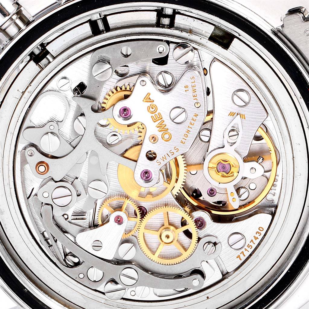 The image shows the intricate inner mechanics of the Omega Speedmaster 3570.50.00 Men
s Stainless Steel Black Dial 3570.50.00 Men
s Stainless Steel Black Dial watch from a back view angle.