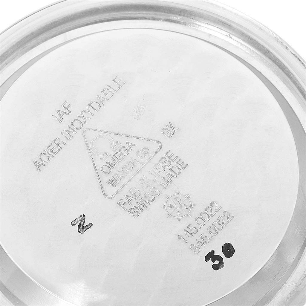 This is the inside case back of an Omega Speedmaster 3570.50.00 Men
s Stainless Steel Black Dial 3570.50.00 Men
s Stainless Steel Black Dial watch, showing its markings and model numbers.