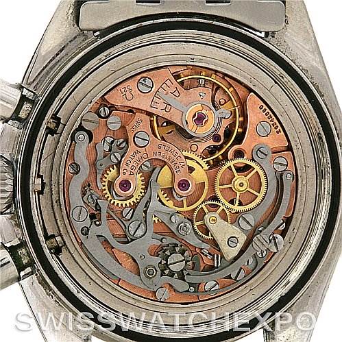 The image shows the internal mechanism and movement of an Omega Speedmaster Men's Stainless Steel Black Dial Men's Stainless Steel Black Dial watch, viewed from the back.