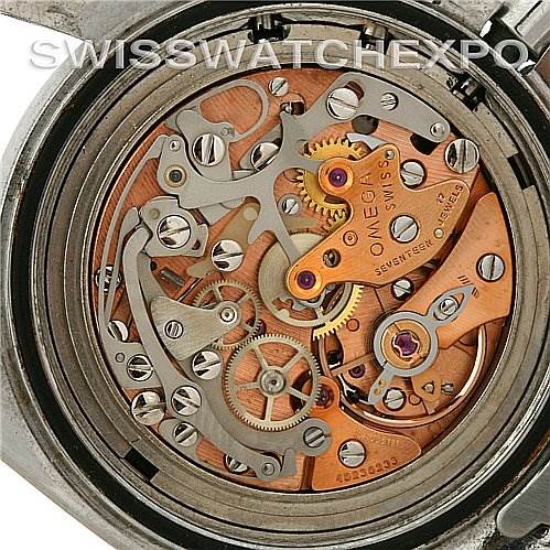 This image shows the intricate inner mechanics of an Omega Speedmaster Men
s Stainless Steel Black Dial Men
s Stainless Steel Black Dial watch from a top-down view.