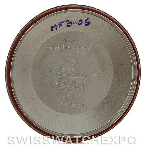 This image shows the back case of an Omega Speedmaster Stainless Steel Black Dial Stainless Steel Black Dial watch, featuring inscriptions and stamps.