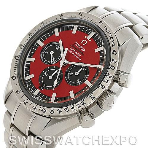 The image shows the Omega Speedmaster 3506.61 Stainless Steel Red Dial 3506.61 Stainless Steel Red Dial watch at a slight angle, highlighting the red dial, tachymeter bezel, and stainless steel bracelet.
