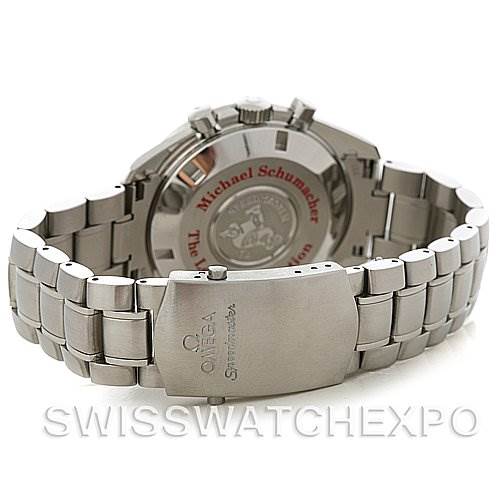 This image shows the back and clasp of an Omega Speedmaster 3506.61 Stainless Steel Red Dial 3506.61 Stainless Steel Red Dial, highlighting the metal bracelet and engraved case back.