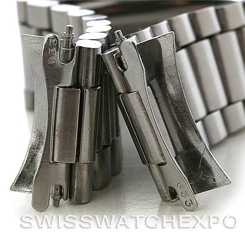 The image shows a close-up of the clasp and end links for the Omega Speedmaster Men's Stainless Steel Black Dial Men's Stainless Steel Black Dial watch bracelet at a slight angle.