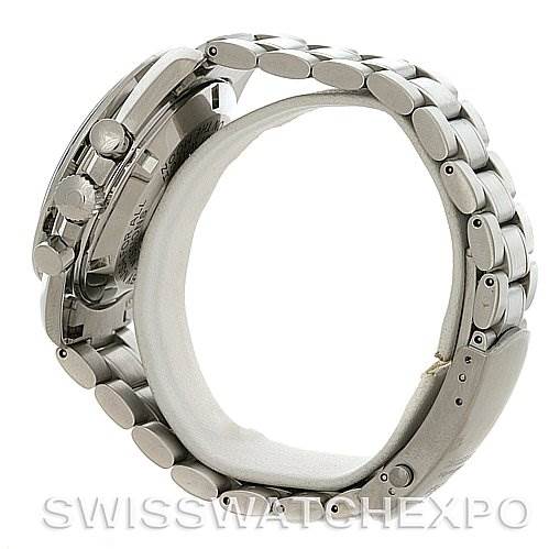 The image shows a side view of an Omega Speedmaster 3570.50 Men
s Stainless Steel Black Dial 3570.50 Men
s Stainless Steel Black Dial watch, focusing on the metal bracelet and case sides.