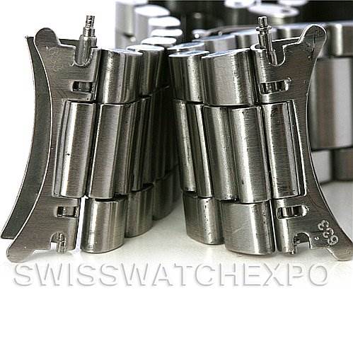 The image shows a close-up of the stainless steel bracelet links and end pieces of an Omega Speedmaster Men
s Stainless Steel Black Dial Men
s Stainless Steel Black Dial watch.