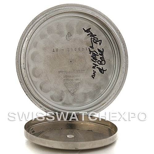 This image shows the open case back of an Omega Speedmaster Men
s Stainless Steel Black Dial Men
s Stainless Steel Black Dial watch, displaying the inner markings and engravings.