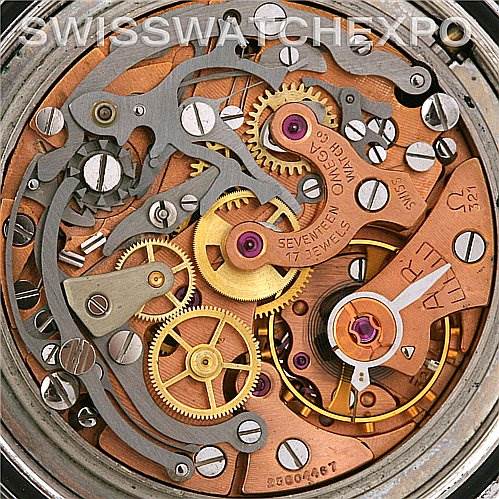 The image shows the intricate internal mechanics of the Omega Speedmaster Men
s Stainless Steel Black Dial Men
s Stainless Steel Black Dial watch from a back or internal angle.