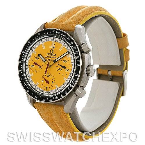 The image shows a side-angle view of the Omega Speedmaster 3810.12.40 Men's Stainless Steel Yellow Dial 3810.12.40 Men's Stainless Steel Yellow Dial watch, highlighting its yellow dial, black tachymeter bezel, and leather strap.