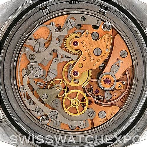 This image shows a close-up view of the movement mechanism of an Omega Speedmaster Men
s Stainless Steel Black Dial Men
s Stainless Steel Black Dial watch.