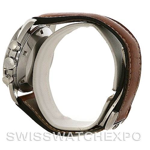 This Omega Speedmaster Men
s Stainless Steel Black Dial Men
s Stainless Steel Black Dial watch is shown from a side angle, highlighting the case, crown, pushers, and brown leather strap.