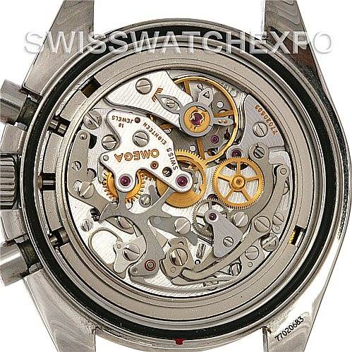 This image shows the intricate backside mechanism of the Omega Speedmaster 3570.50.00 Men
s Stainless Steel Black Dial 3570.50.00 Men
s Stainless Steel Black Dial watch, including gears and internal components.