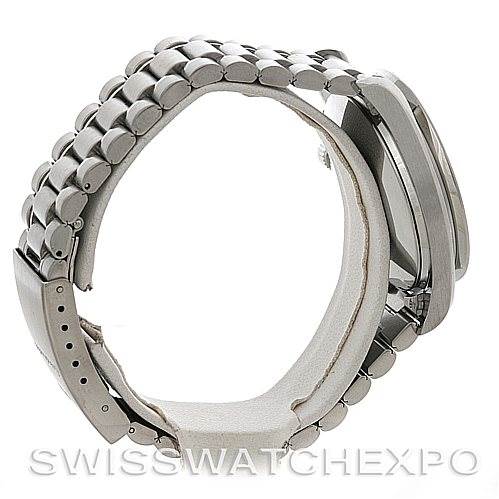 The image shows a side view of the Omega Speedmaster 3510.50.00 Men
s Stainless Steel Black Dial 3510.50.00 Men
s Stainless Steel Black Dial watch, focusing on the clasp and bracelet.