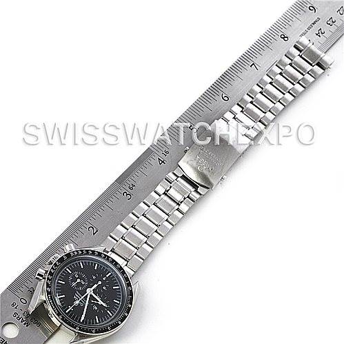 The image shows an Omega Speedmaster 3570.50.00 Men
s Stainless Steel Black Dial 3570.50.00 Men
s Stainless Steel Black Dial watch with a metal bracelet, placed alongside a ruler for measurement.