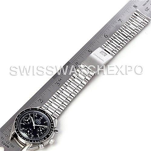 The image shows an Omega Speedmaster 3510.50.00 Men
s Stainless Steel Black Dial 3510.50.00 Men
s Stainless Steel Black Dial watch laid out flat with a ruler alongside it, displaying the entire bracelet and watch face from above.