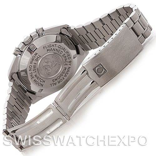 The image shows the back and middle part of the Omega Speedmaster 3570.50.00 Men
s Stainless Steel Black Dial 3570.50.00 Men
s Stainless Steel Black Dial watch, featuring its engraved case back and metal bracelet.