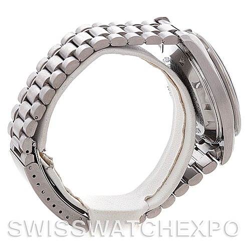 The image shows a side view of an Omega Speedmaster 3570.50.00 Men
s Stainless Steel Black Dial 3570.50.00 Men
s Stainless Steel Black Dial, focusing on the stainless steel bracelet and the side profile of the watch case.