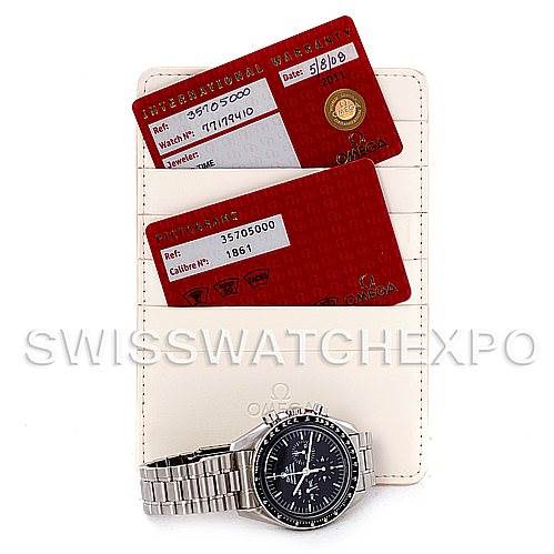 The image shows an Omega Speedmaster 3570.50.00 Men
s Stainless Steel Black Dial 3570.50.00 Men
s Stainless Steel Black Dial watch at a top-down angle, accompanied by its warranty cards and holder.